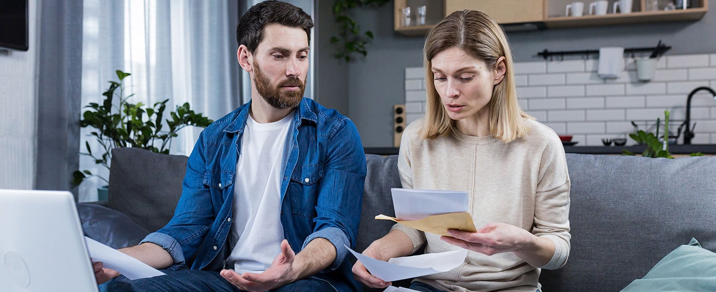 Couple looking Over Taxes
