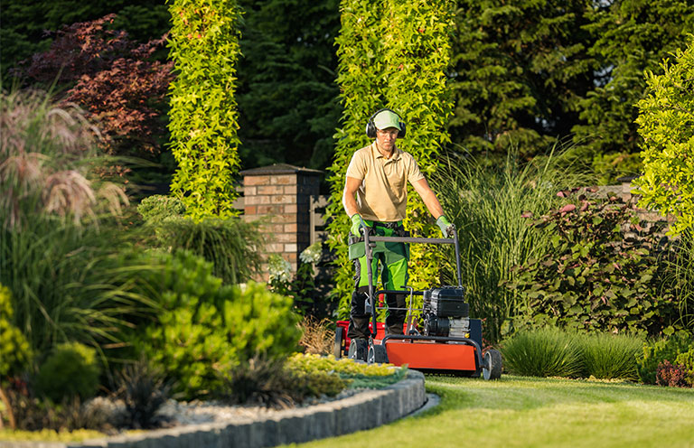 man mowing lawn