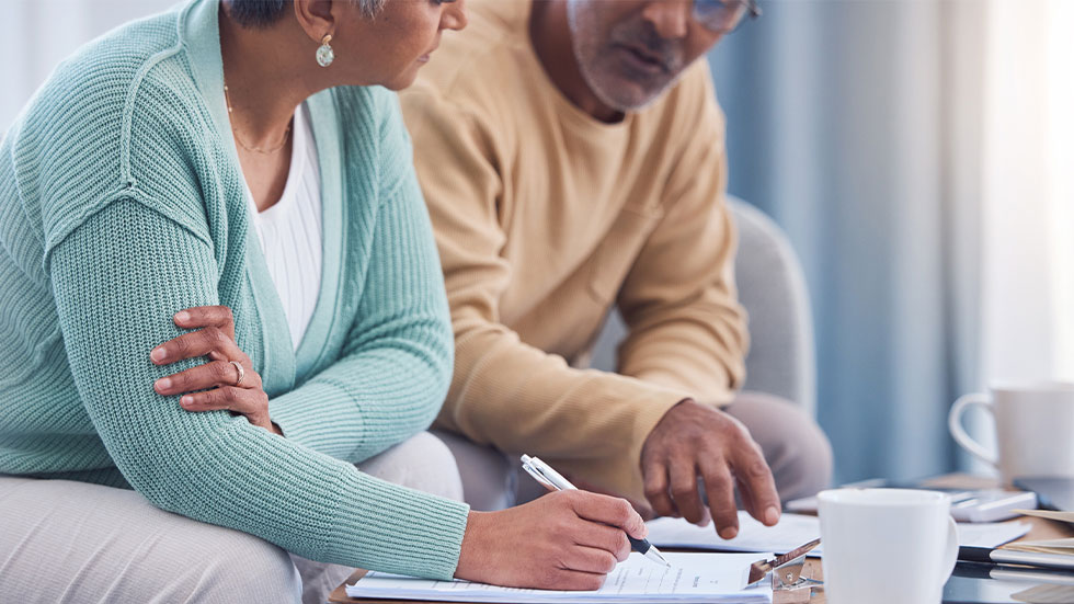 couple looking at paperwork together