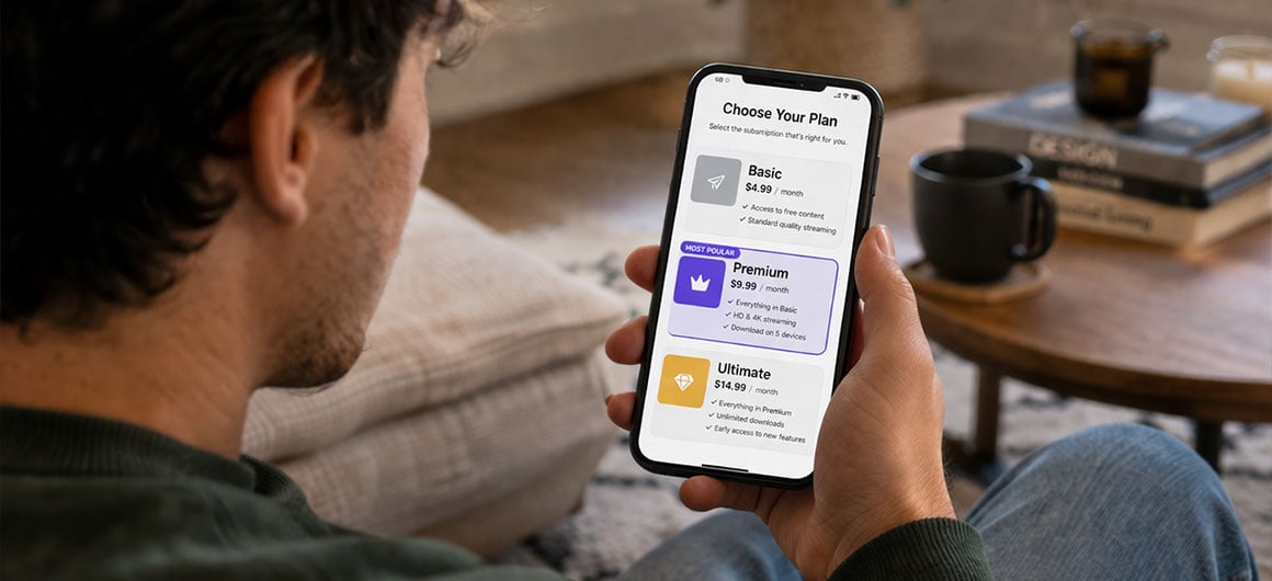 man looking at subscription tiers on phone