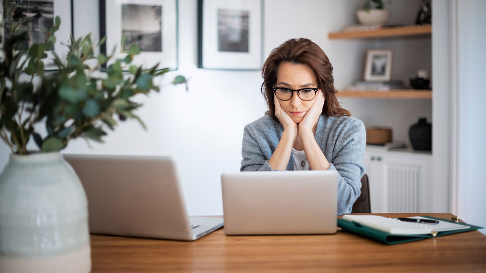 woman looking at laptop