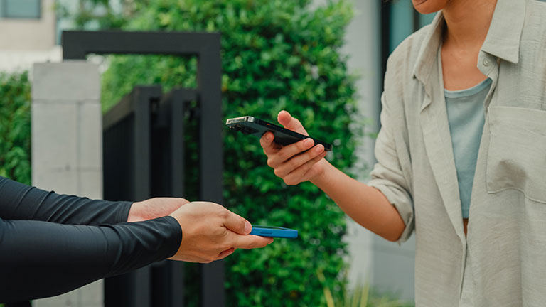 mobile paying at the coffee shop. stock photo