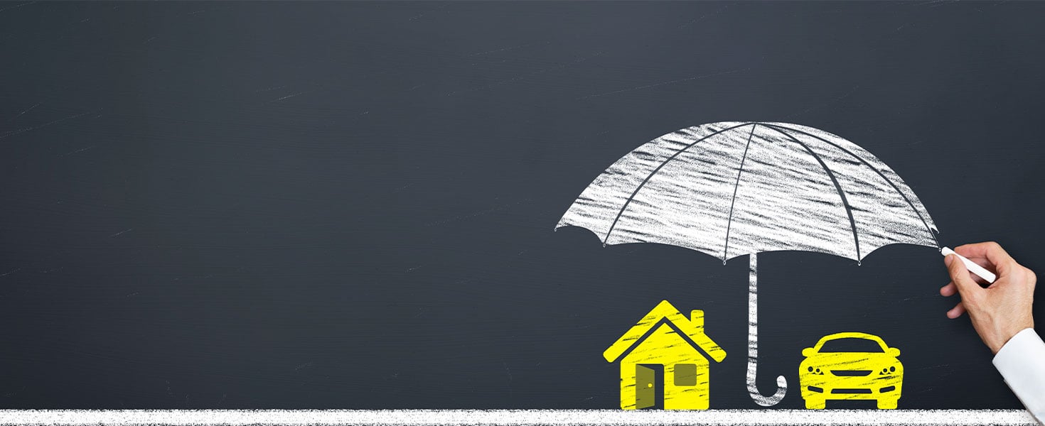 chalk drawing of umbrella over car and house