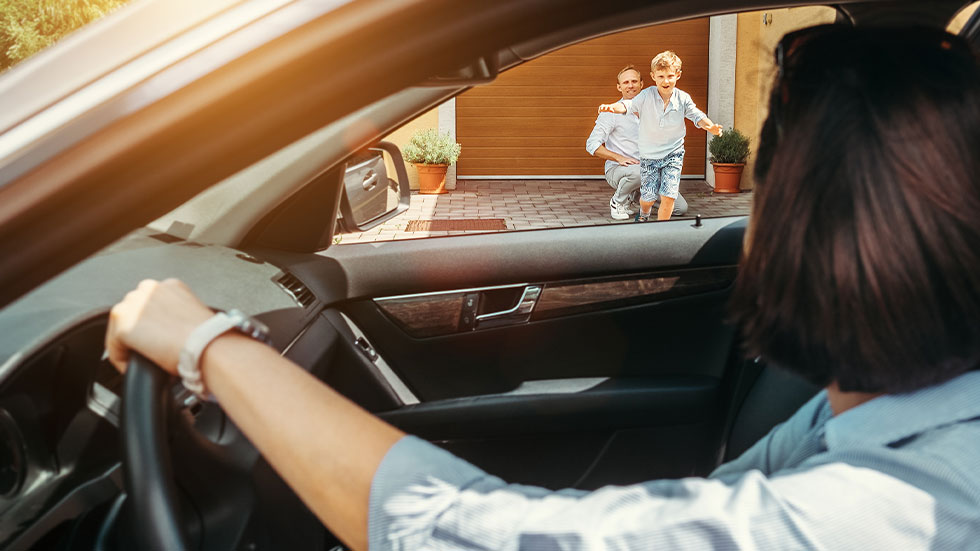 mother looking at family through car window