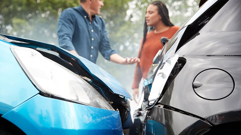 blue car rear ends black car in accident