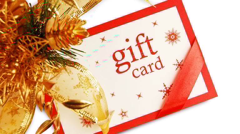 Christmas Gift Card - self designed and then clicked. Focus more on text. Isolated over white. Credit:desifoto