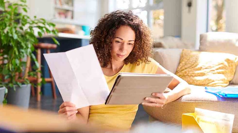 Woman Looking at finances