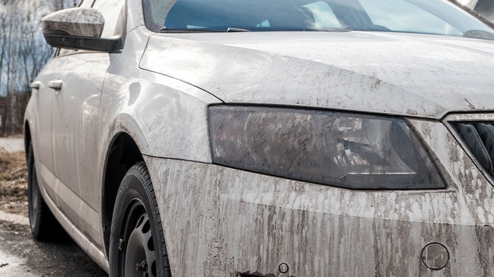 dirty white car