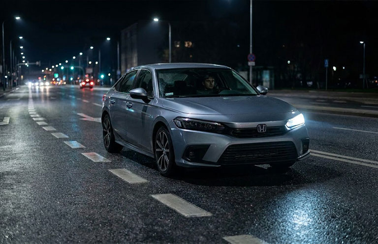 car with one headlight out