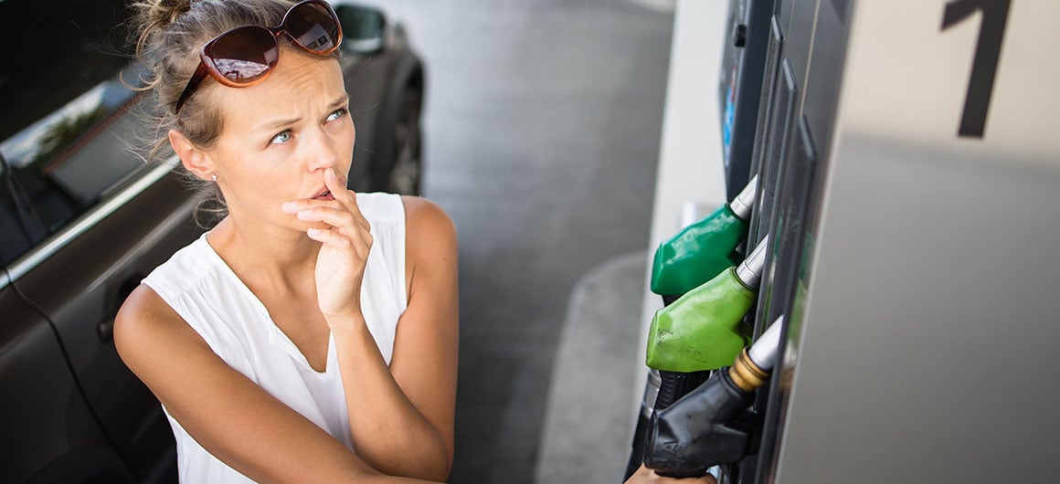 Car pumping gas at gas pump; Credit: ViktorCap