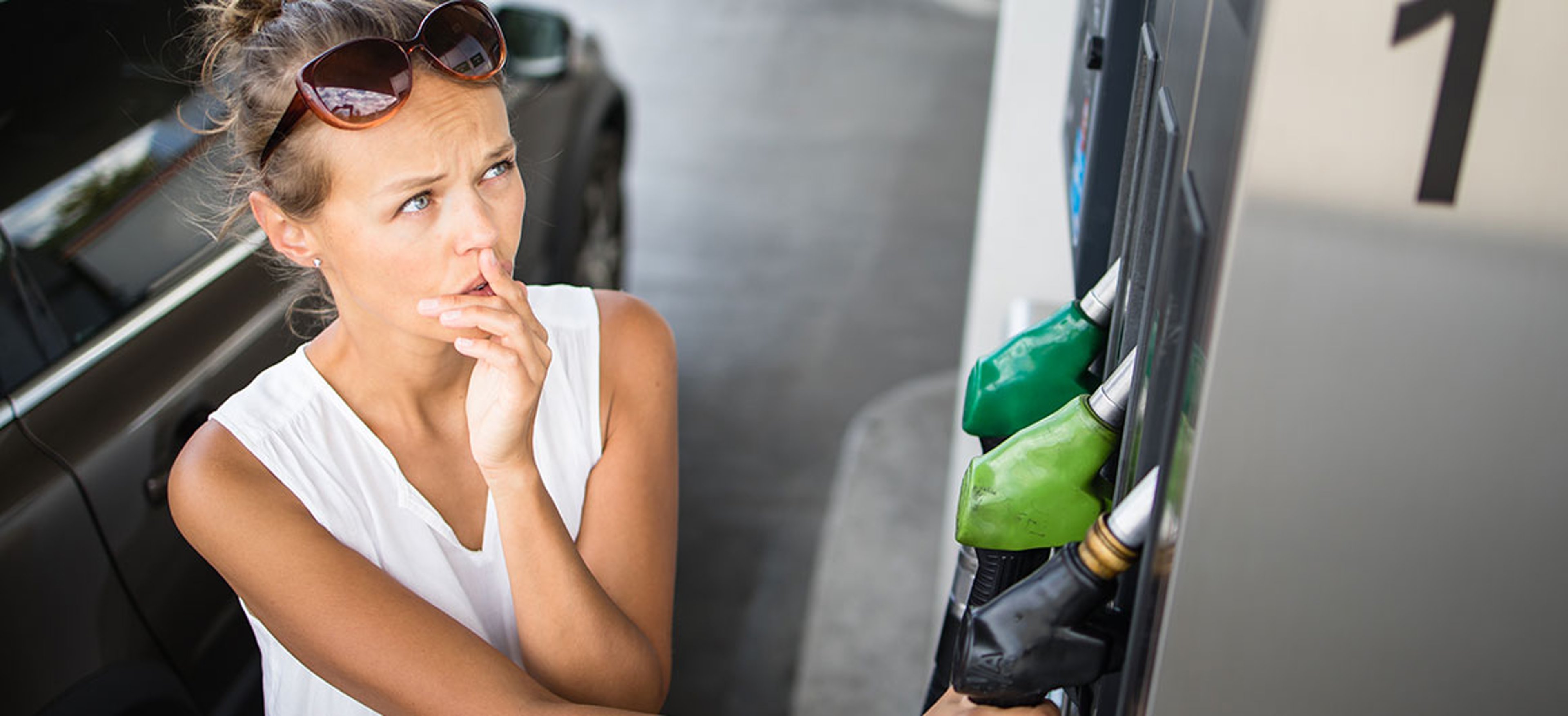 Car pumping gas at gas pump; Credit: ViktorCap