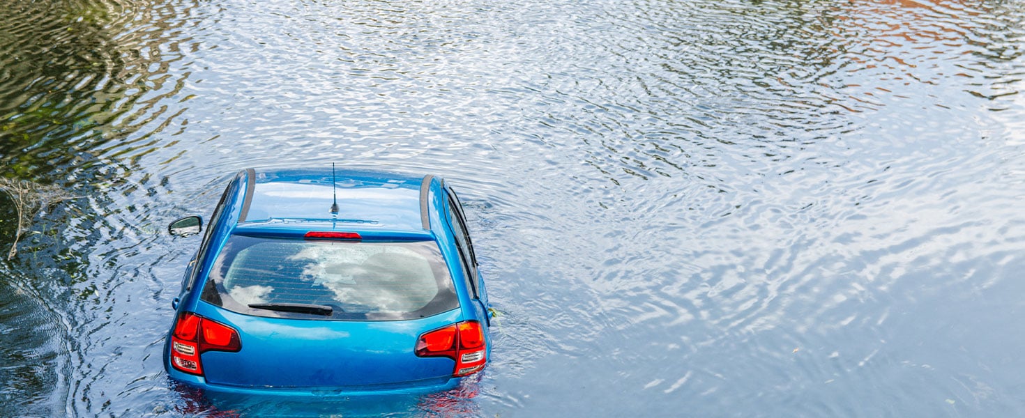 car partially submerged in water