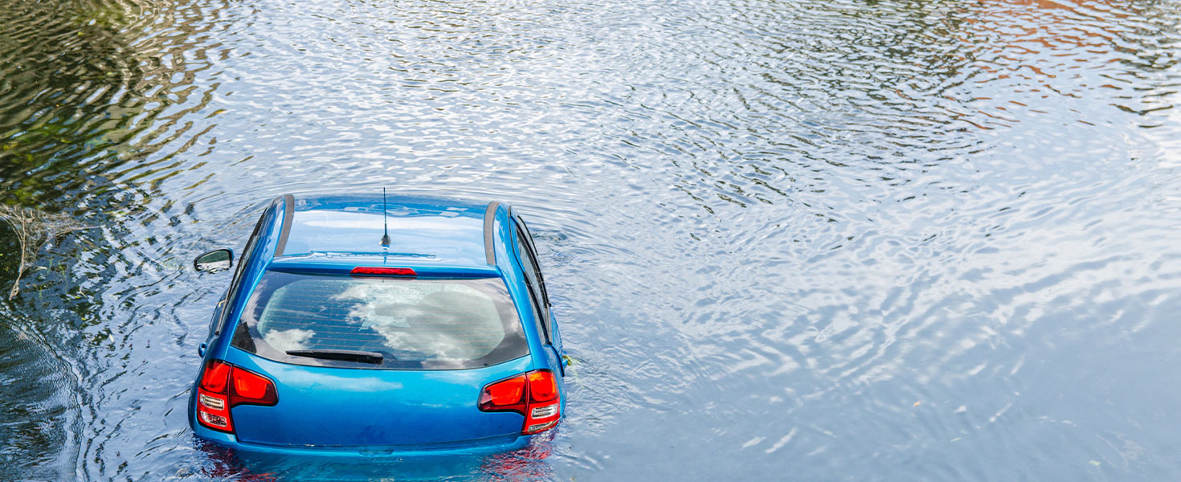 car partially submerged in water