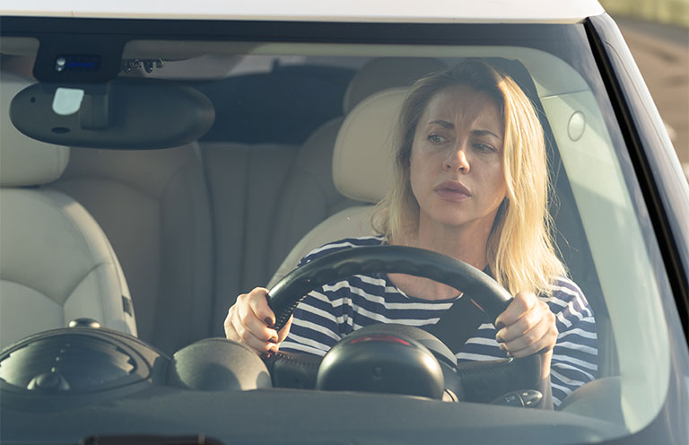 woman driver worried