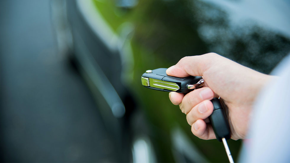 person using car fob