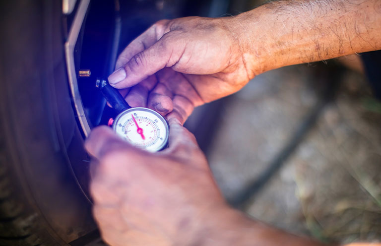 checking tire pressure