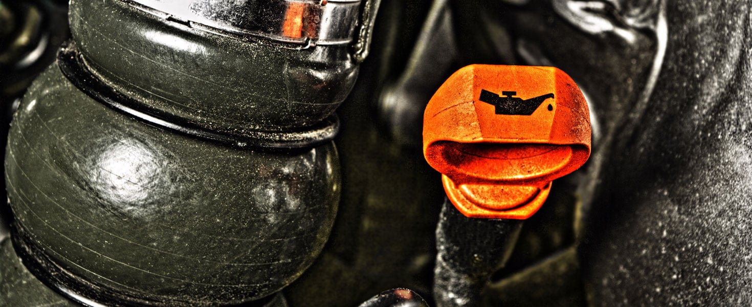 Top of oil dipstick in a car engine