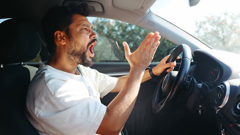 Young man getting angry on the road. Credit: ozgurcankaya