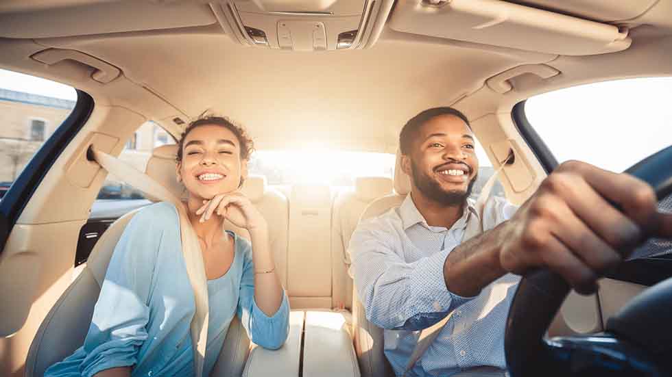 Couple driving together