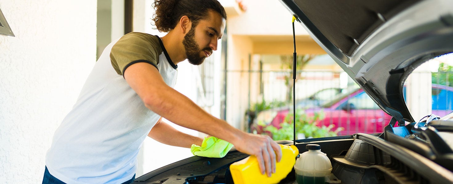 Man changing oil