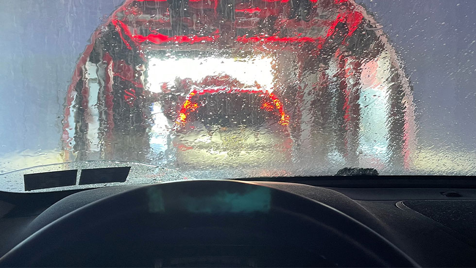 pov entering car wash 