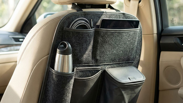 Car backseat organizer Image generated with Runway AI, Art directed by Andrea M. Corbin