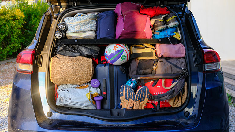 The trunk of a car fully packed for a family summer holiday adventure Credit:David Cameron