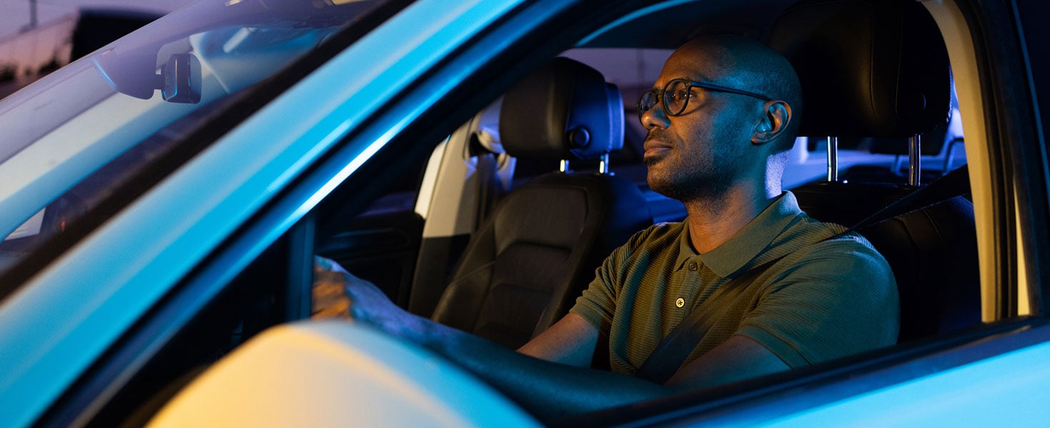 Man driving at night
