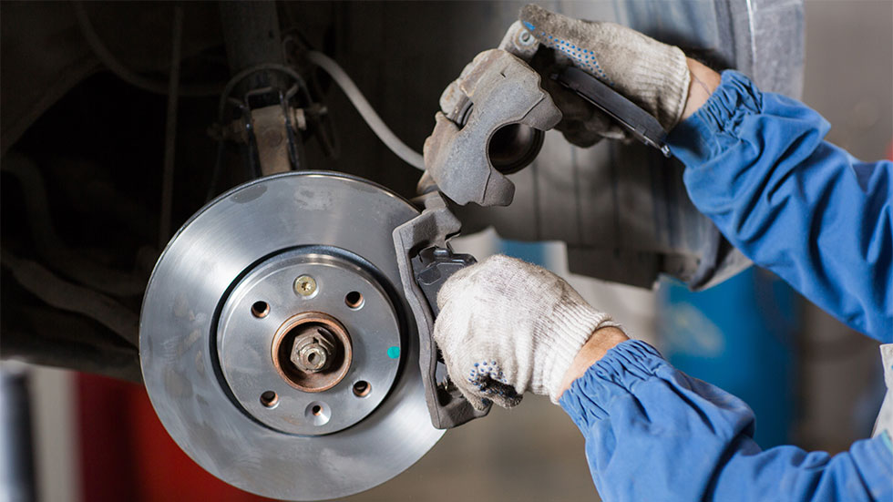 brake pads being changed 