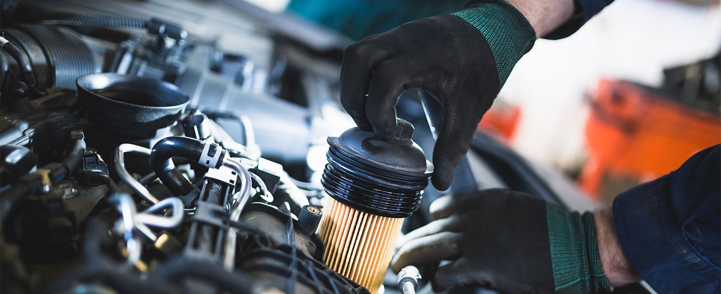 car fuel filter being replaced