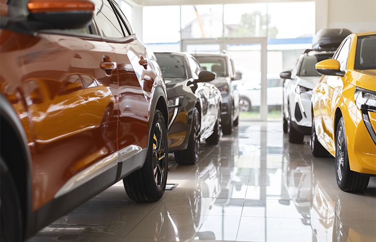 cars on car dealership sales floor