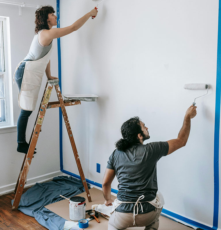 A Couple Painting The Wall Credit: Blue Bird
