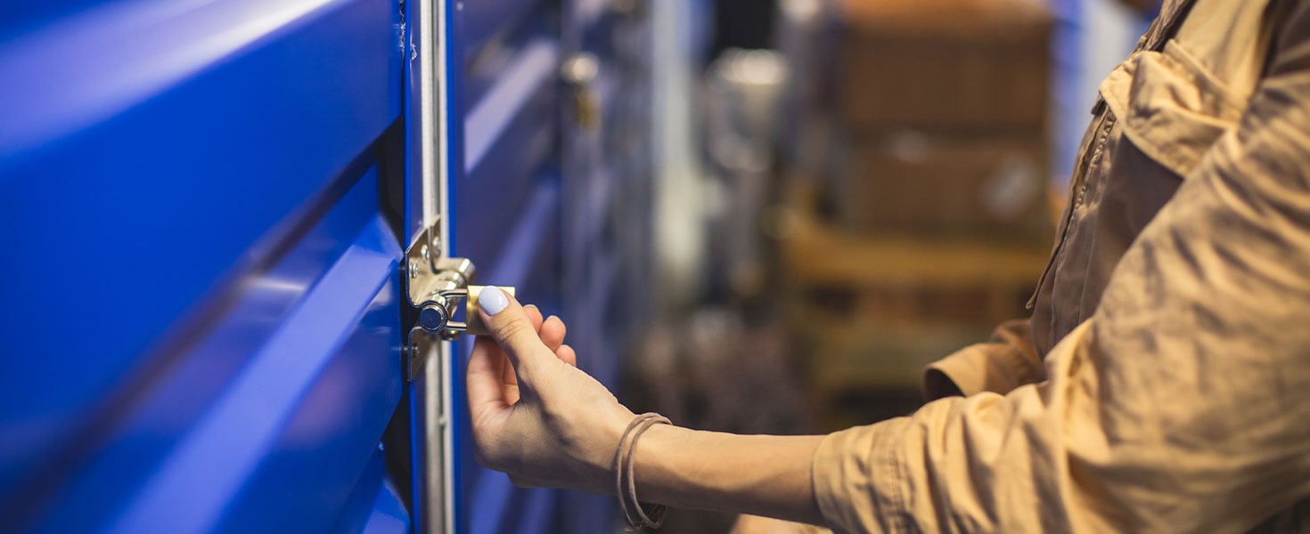 Person locking storage unit door