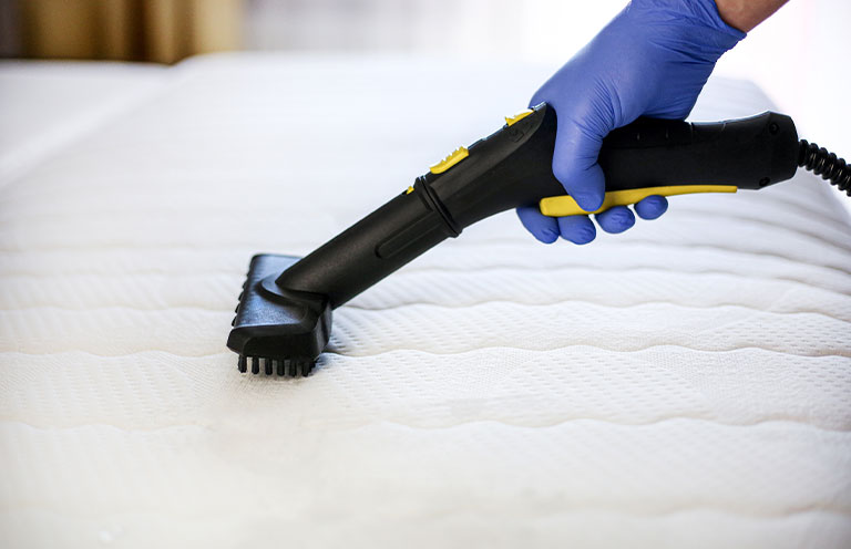 vacuuming mattress