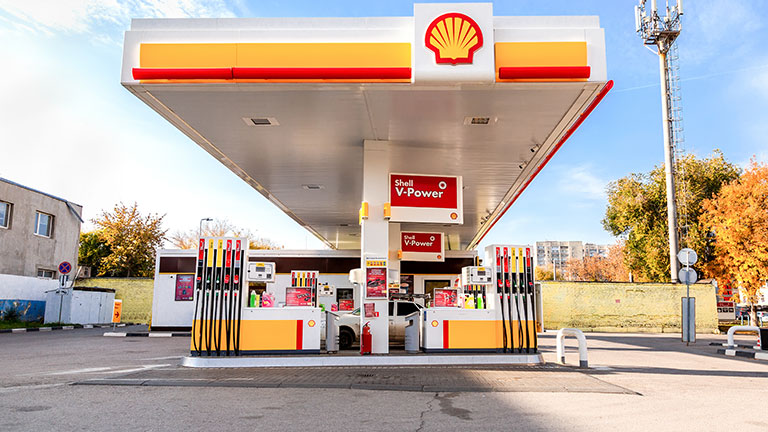 High gas prices on red sign. Cash, Credit, Debit price for regular, plus and premium gasoline  by MichaelVi