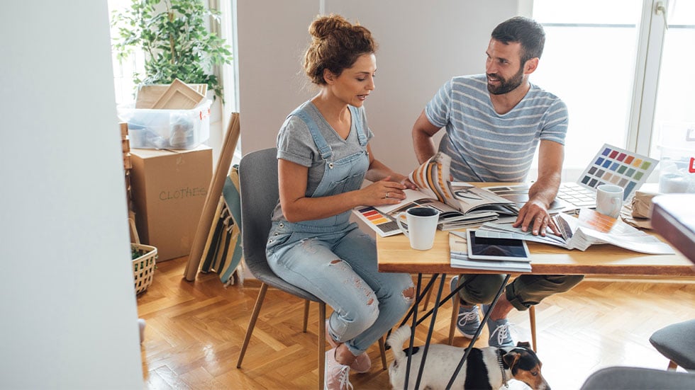 Man and woman planning home renovation