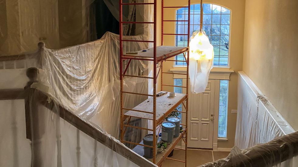 Home renovation with plastic protecting rooms