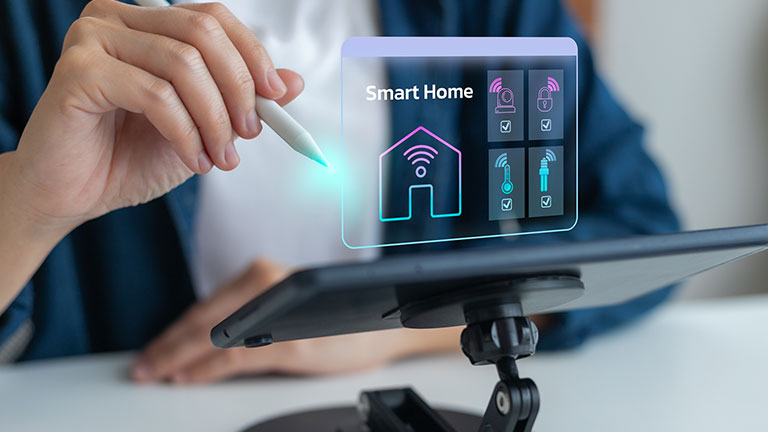 Person using tablet with smart home automation hologram, concept of IoT technology, wireless control, home security, energy management, digital lifestyle, smart devices, and modern living system