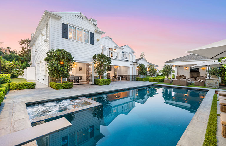 house with swimming pool in backyard
