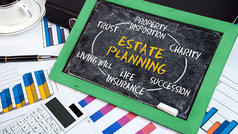 estate planning concept on blackboard By cacaroot