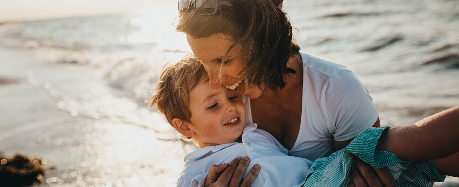 Mother and Son together on the beach