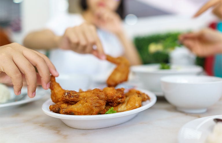 people eating wings