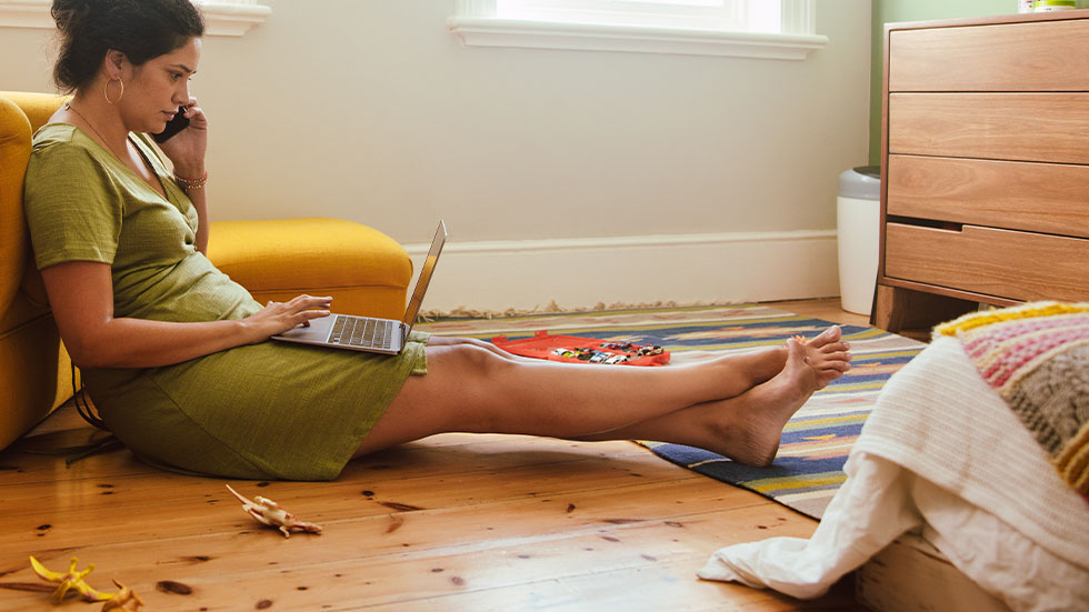 mom in kids room on laptop