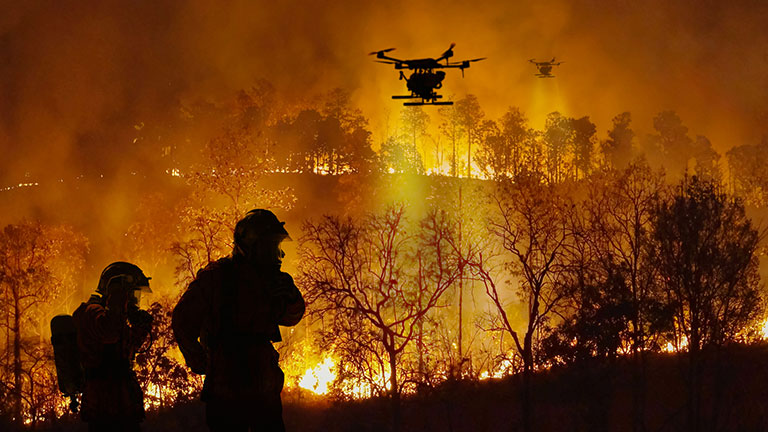 Firefighting drones spray chemical to help control wildfires. Credit:Toa55