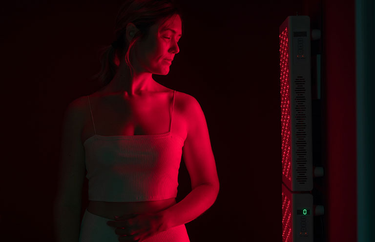 woman partaking in red-light therapy