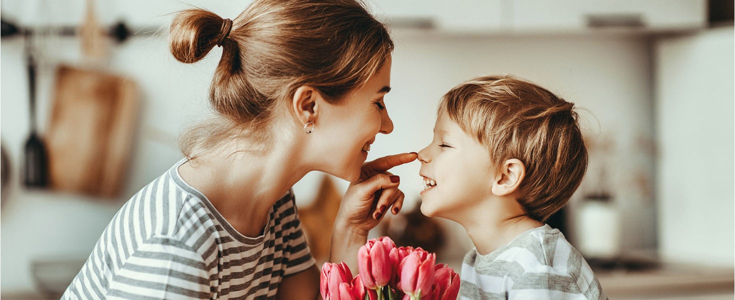 Mother and son with flowers