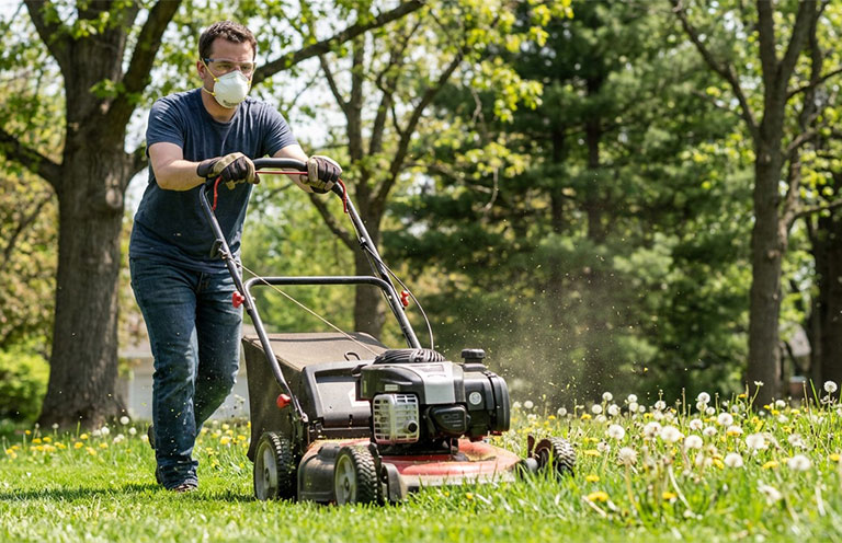 man mowing the lawn