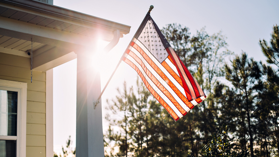 American Flag on front porch of house