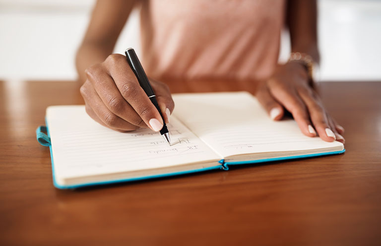 woman creating checklist