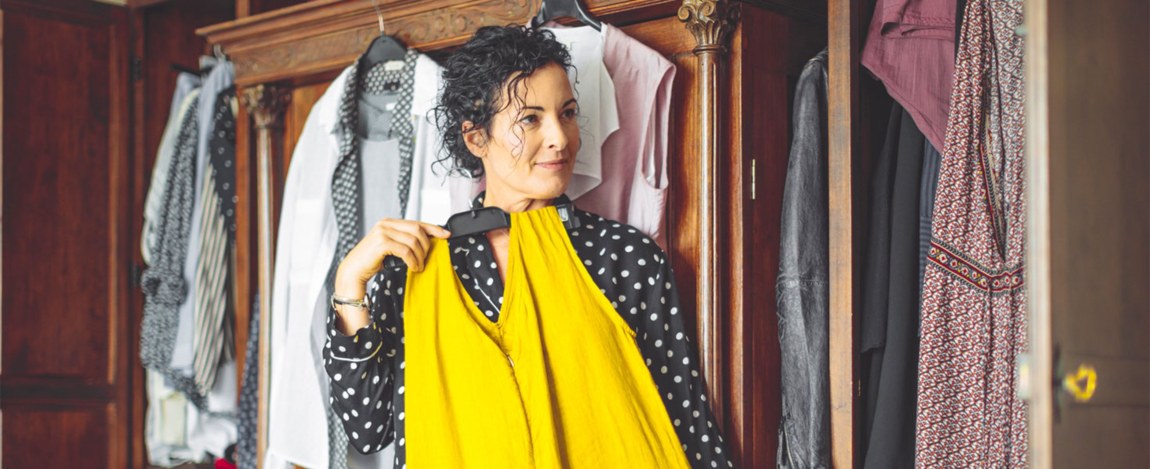 woman looking at clothes